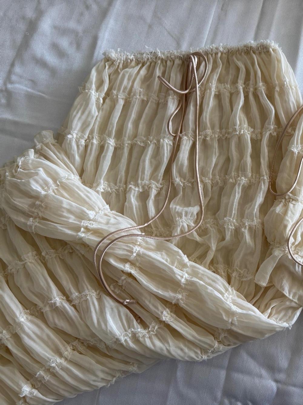 2 piece skirt and shirt that ties around the neck and straps around the back